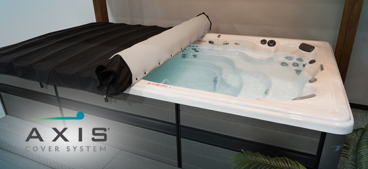 Axis swim spa cover partially rolled on an H2X