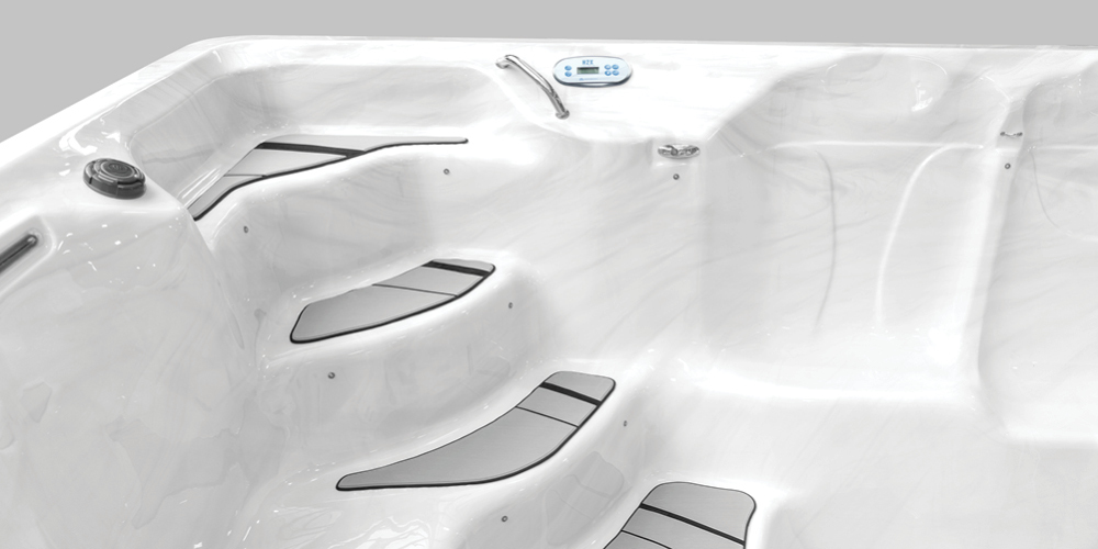 Swim spa steps with Nonslip Comfort floor system installed.